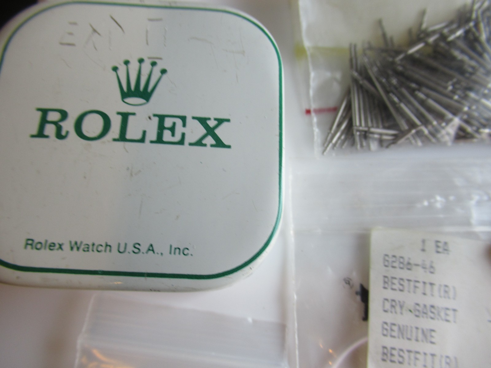 Rolex crystal gaskets hands tin box Various Misc Parts & Brands Lot sold As Is