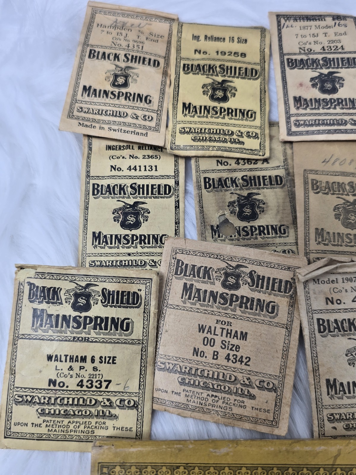 Lot 12 NOS Black Shield Mainsprings Swartchild Elgin Waltham