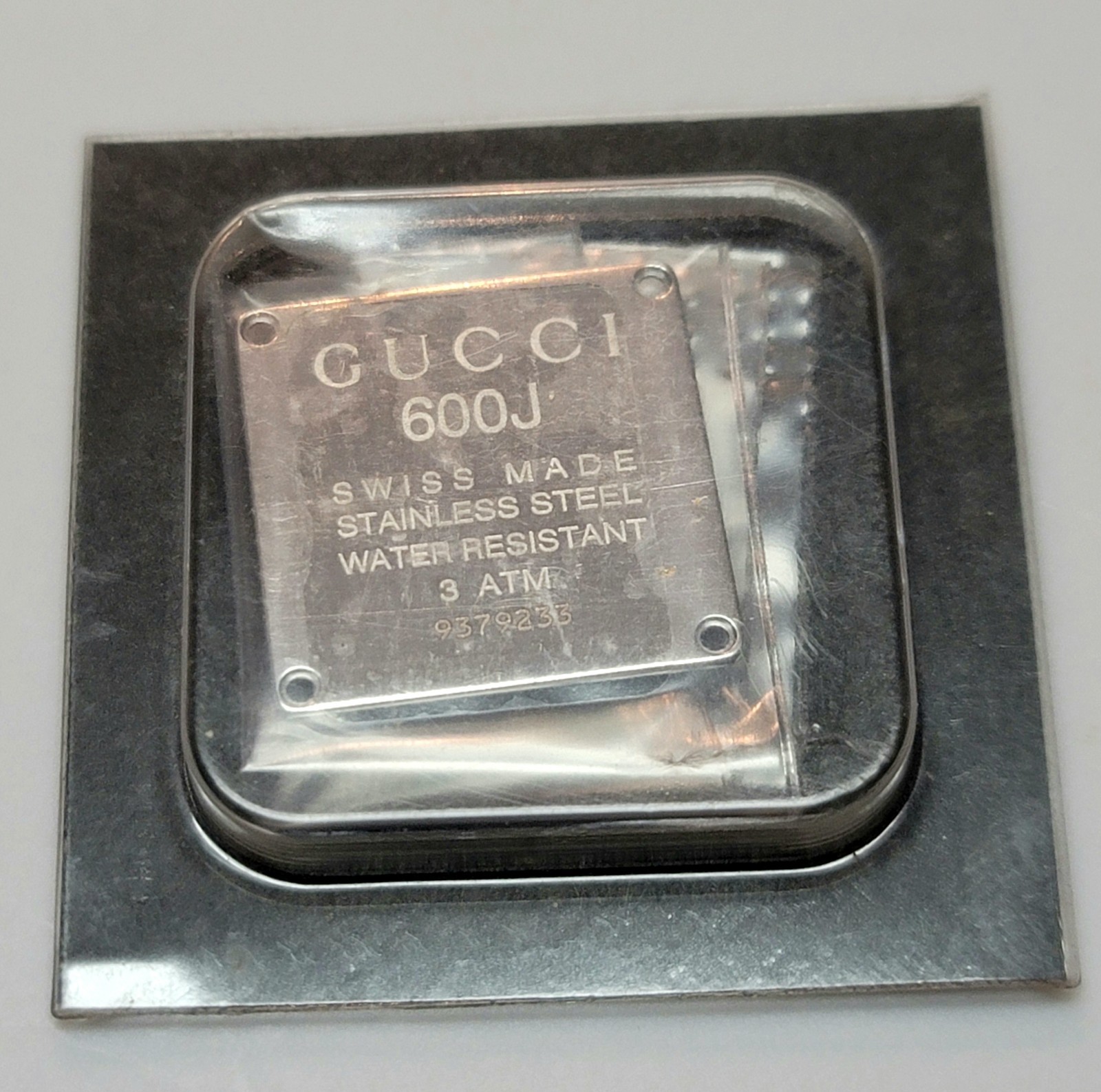 SB4-G7: Brand New Genuine GUCCI 600J Case Back – Silver Tone – Stainless Steel