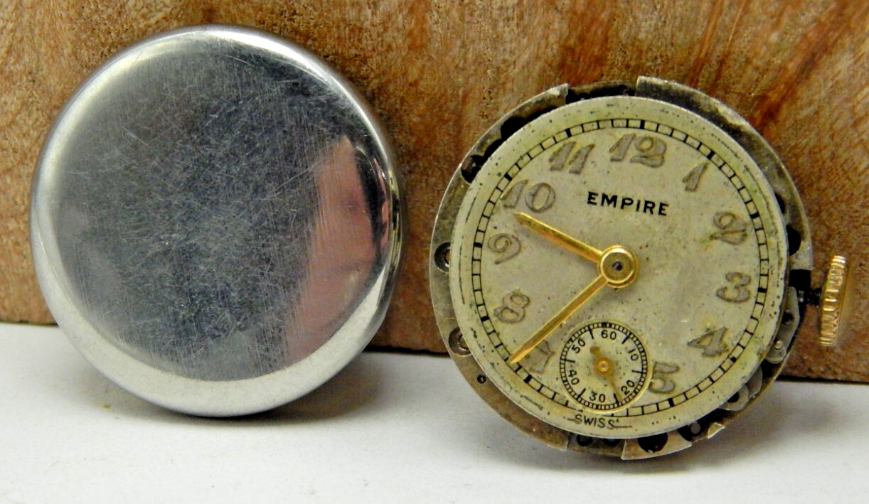 Vintage Empire 7 jewel ladies wrist watch movement with dial hands and case back