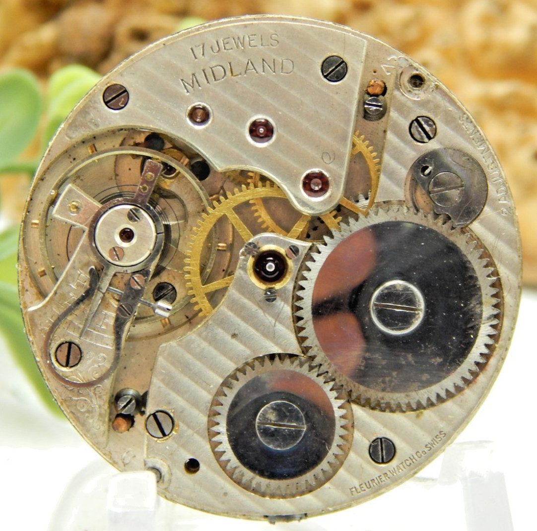 Antique Pocket watch movement Fleurier Midland 12 size 2 adjust swiss 17 jewel