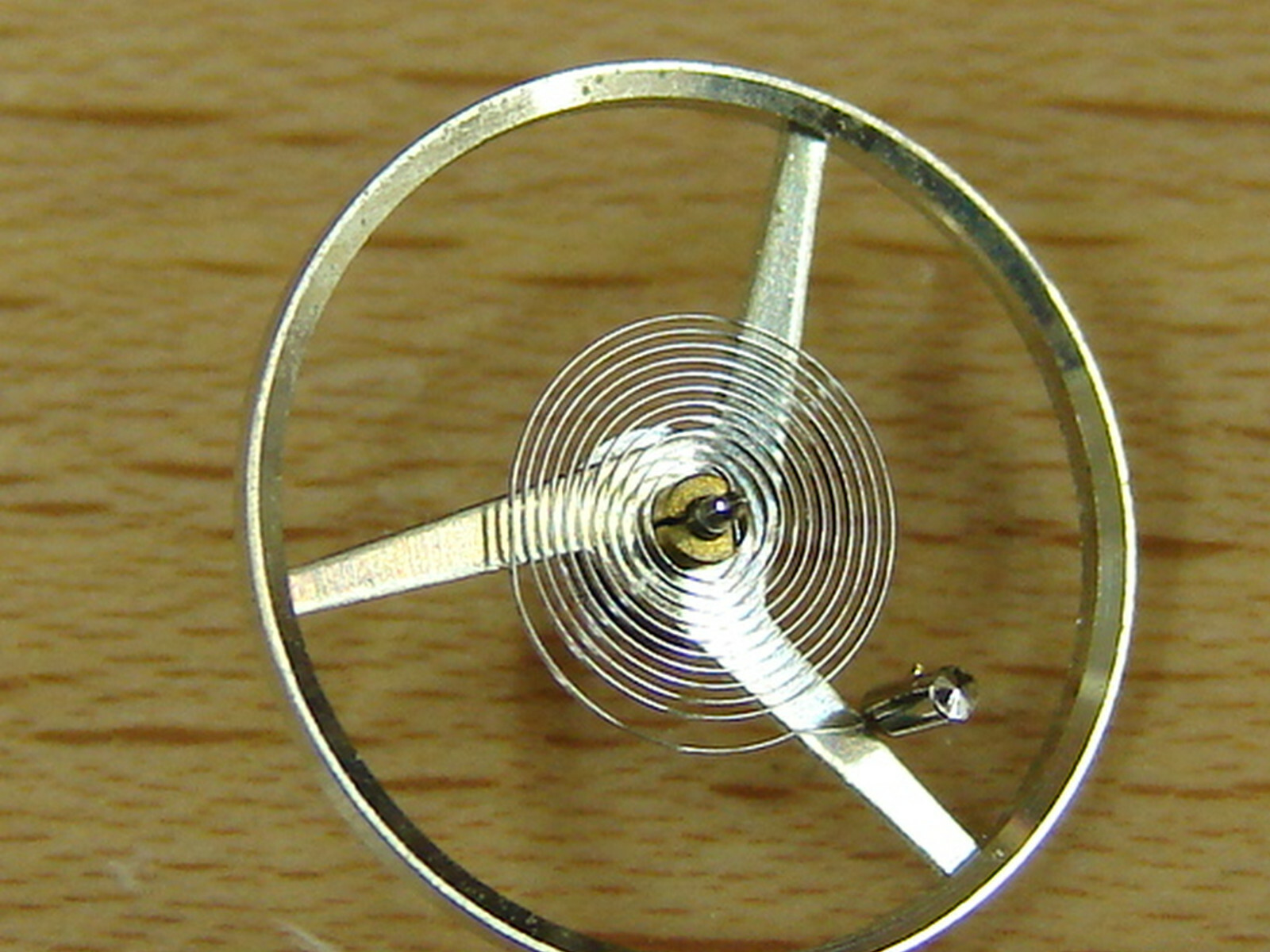 Revue caliber 90, 8 day clock, balance complete, annular type, silver color NOS!