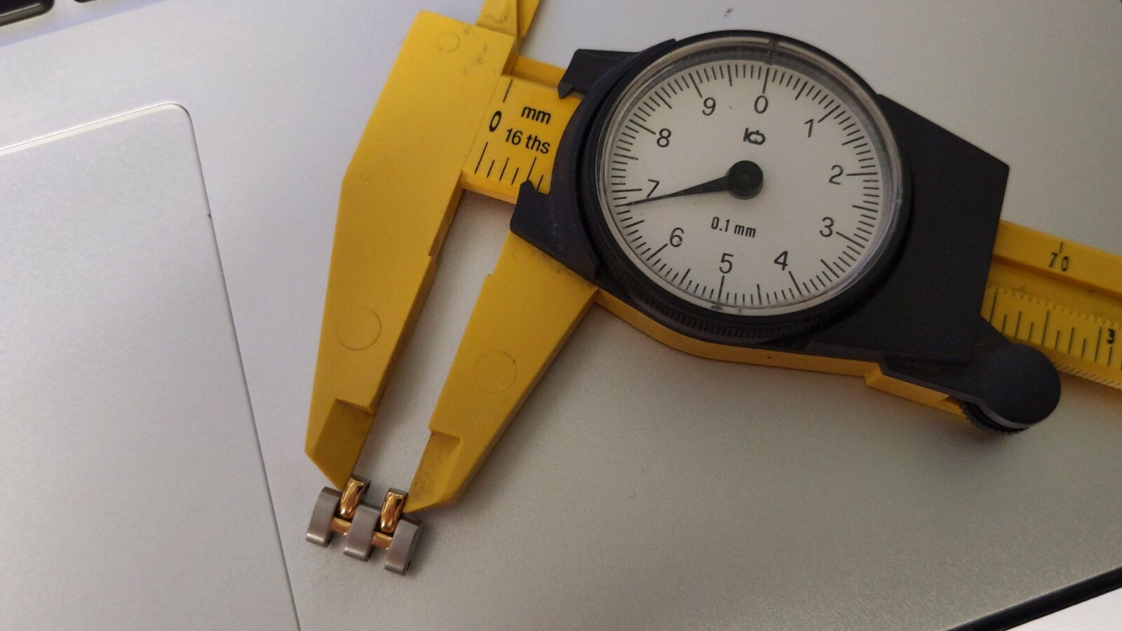 OMEGA LINKS S/S and Yellow 12mm x 6.9mm great condition. for watch repair