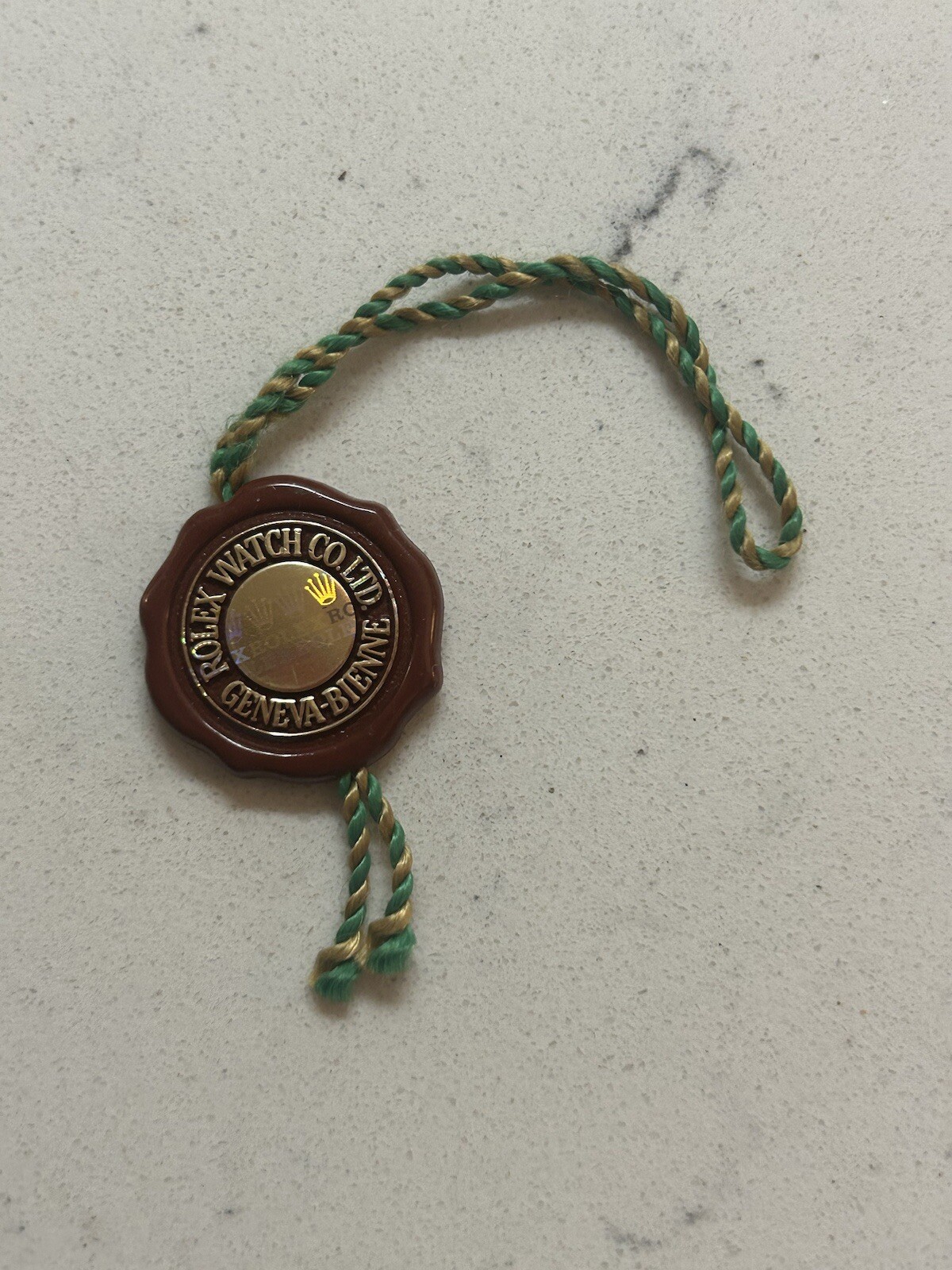 ROLEX Burgundy Hologram Hang Tag Swiss Officially Certified Chronometer