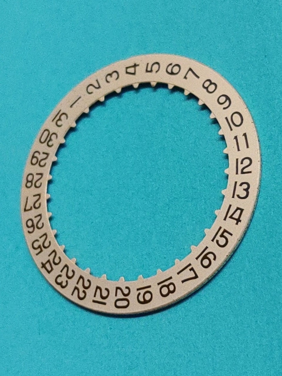 ETERNA Calibre #1438 Date @3 Disc. Part #2557/1. Black On Silver. NOS.