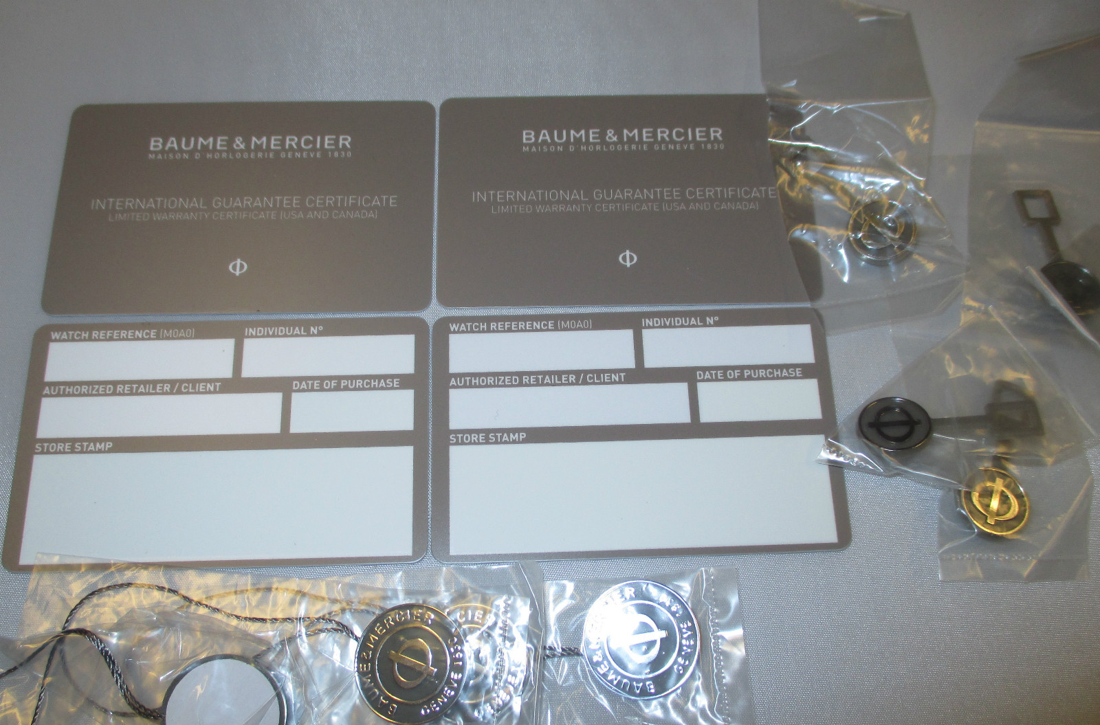 4 Baume & Mercier Watch Guarantee and Limited Warranty Certificate Cards & Tags