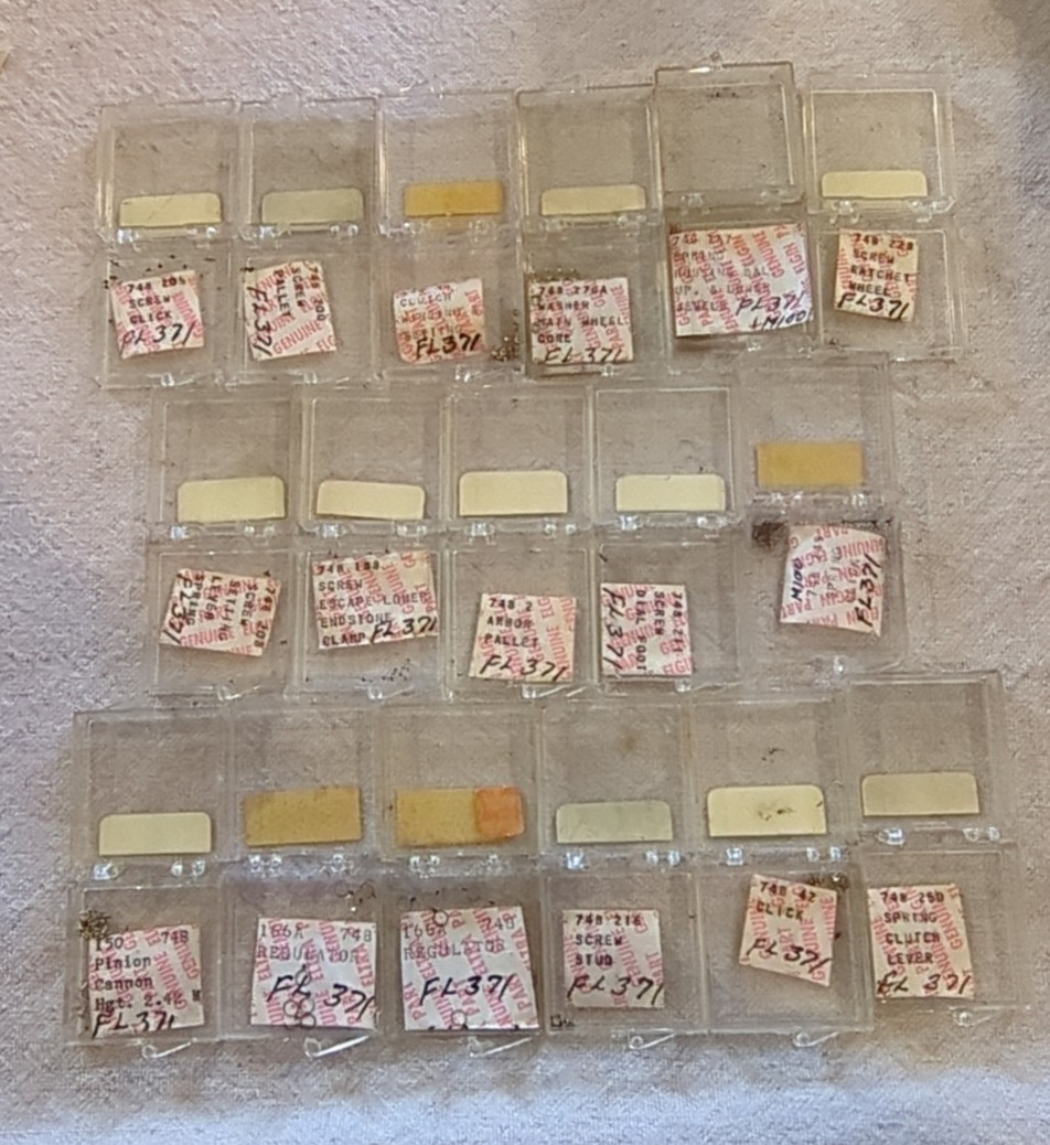 17 Boxes of Elgin 748 Movement Unused Jewels, Screws, Wheels, Regulators Etc…!
