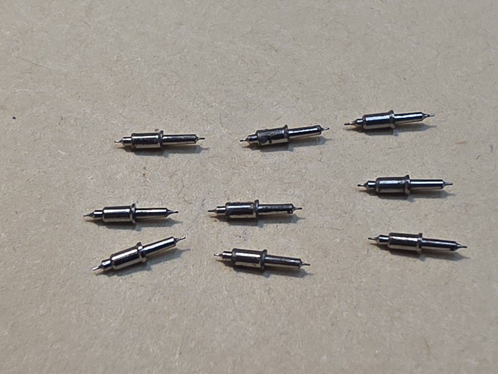 Lot Of 9 NOS Waltham 16s Model 99 Vanguard 4861 Tapered Hub Balance Staffs Parts