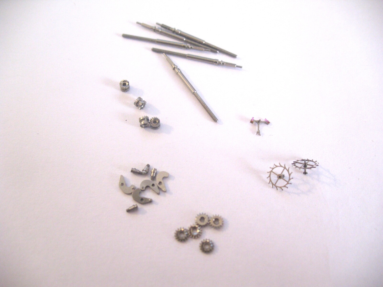 ENICAR 1140,1145 ASSORTED SPARE WATCH MOVEMENT PARTS