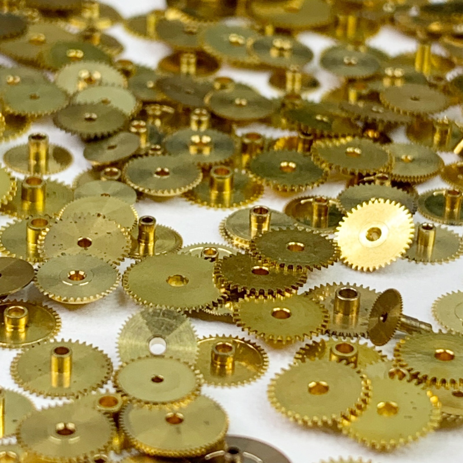 100 Gold Hour Wheels Steampunk Gears Repair Part Watchmaker Lot NOS Altered Art