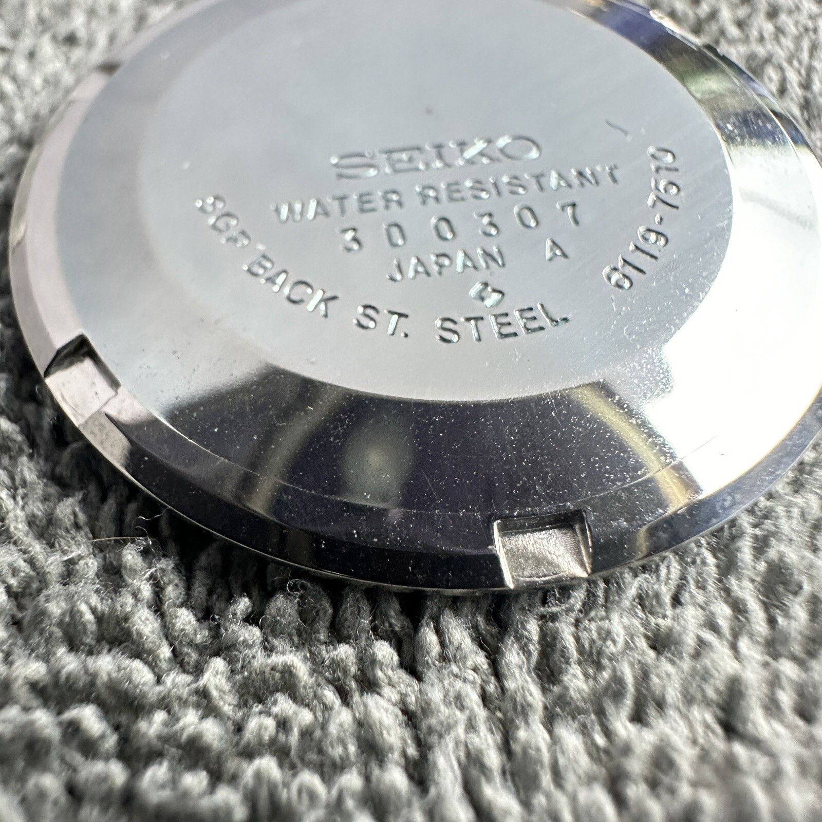 ORIGINAL NOS ‘1973 VINTAGE SEIKO 6119-7510 SGP CASE BACK WITH PROTECTIVE FILM