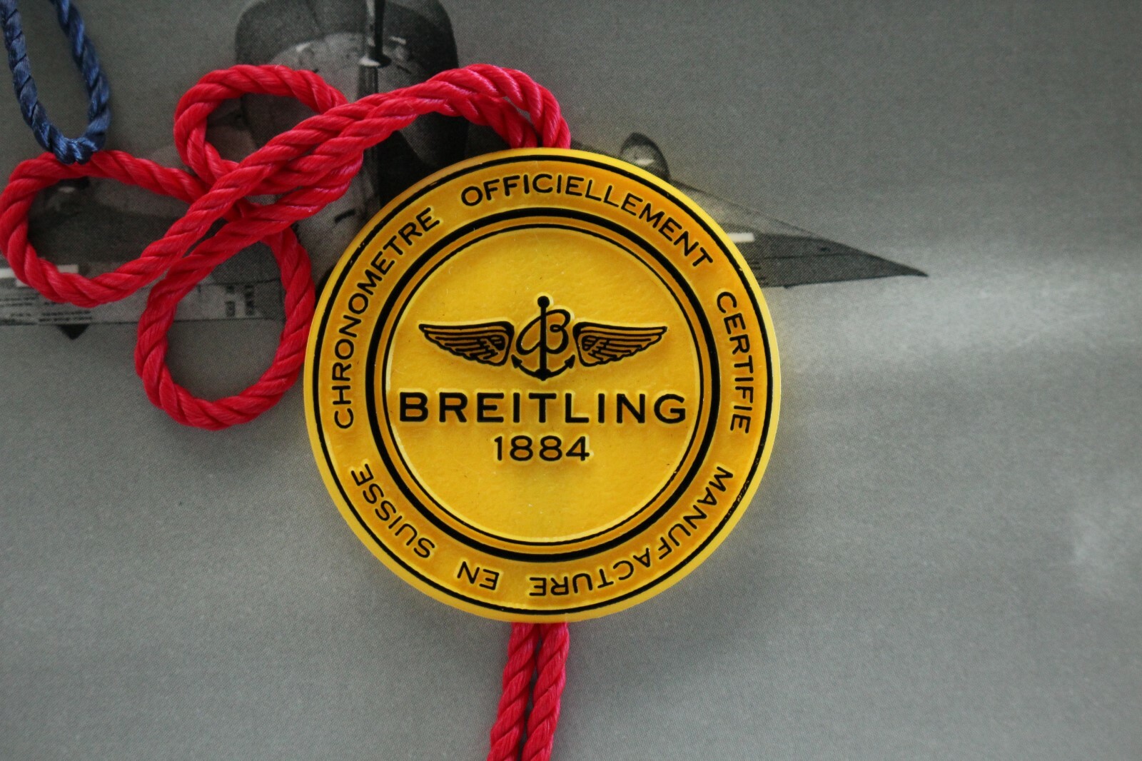 BREITLING FACTORY JEWELERS SALES ACCESSORY YELLOW PLASTIC WATCH HANG – SWING TAG