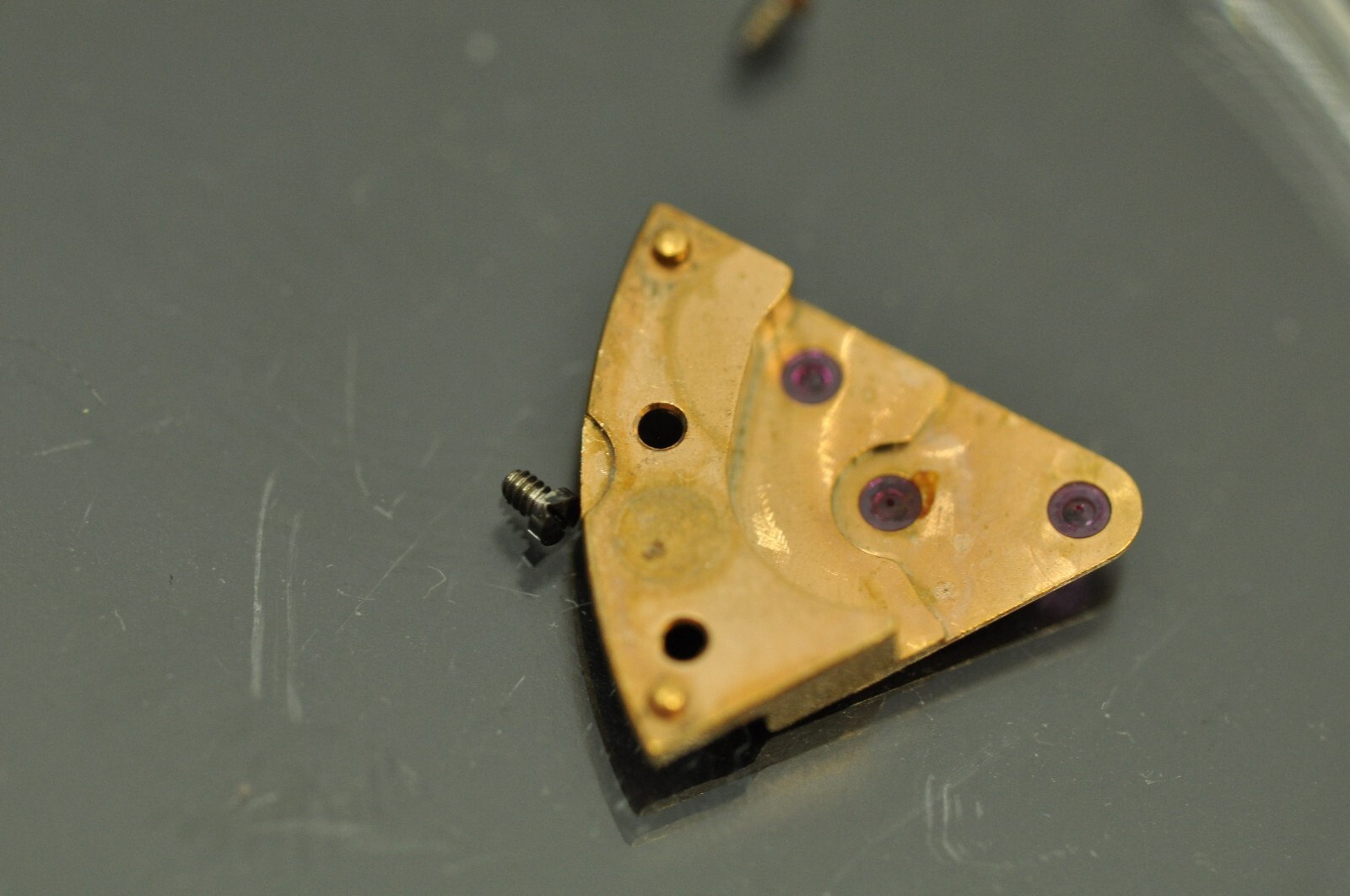 Omega watch part 562-1003 train wheel bridge nice used 23xxxxxxx
