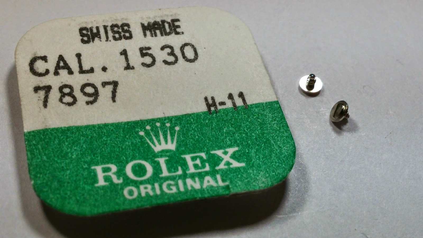 Genuine Authentic Rolex case screw, head flat 1530 7897 watch parts for watch re