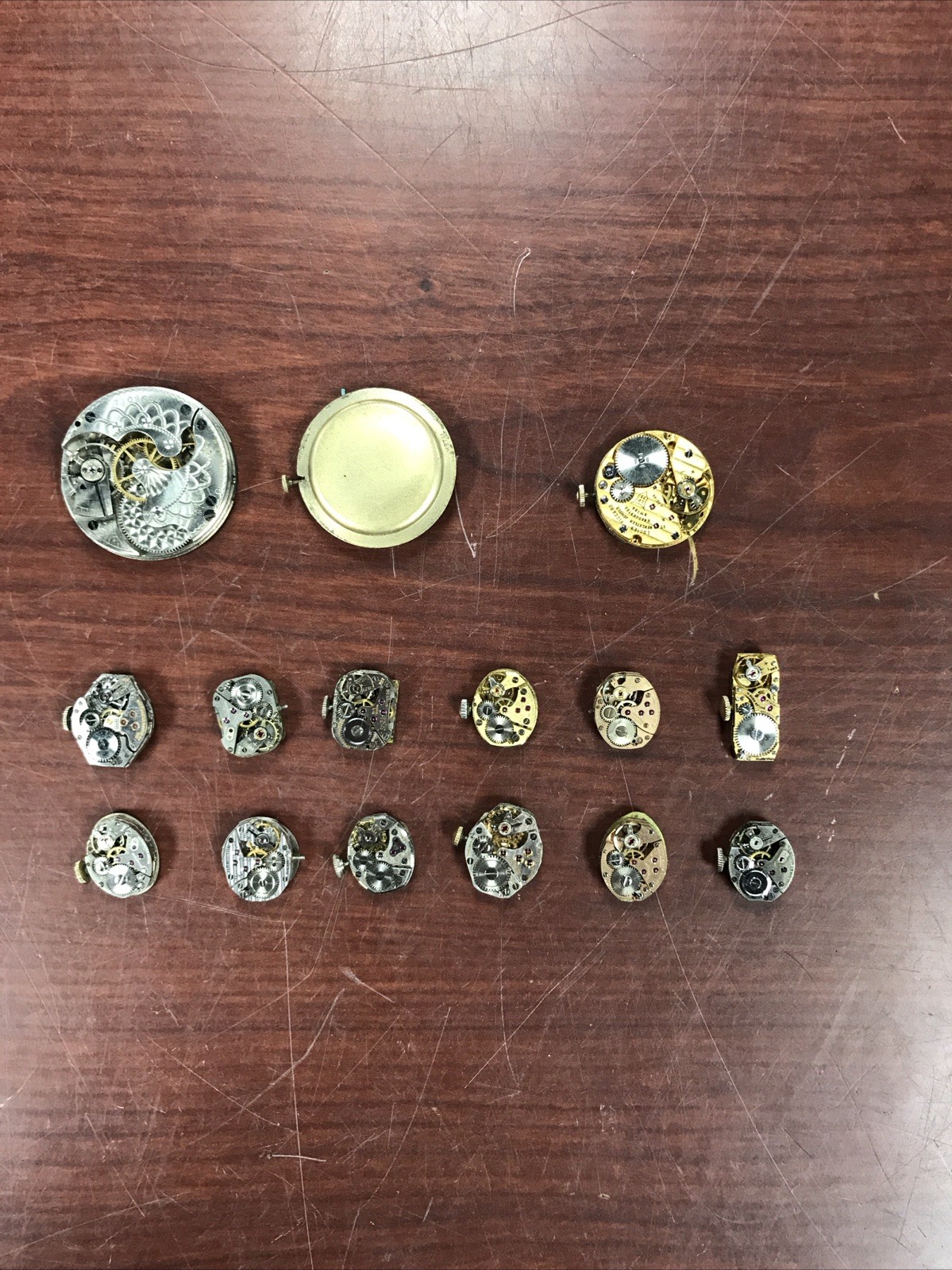 “LOT OF 15 VINTAGE WATCH MECHANISMS, FOR PARTS”