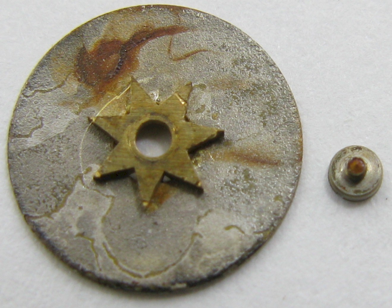 Venus 203 watch movement part: day disc & screw