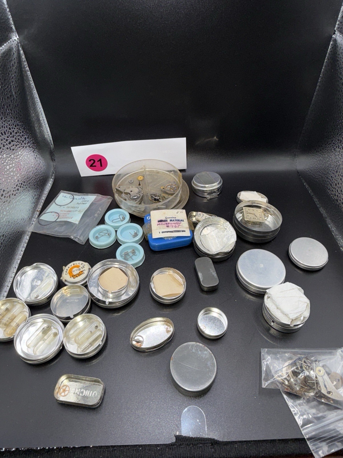 Lot 21 – Watchmaker Parts Lot Movements Staffs Tins Crystals Repair Mixed NOS