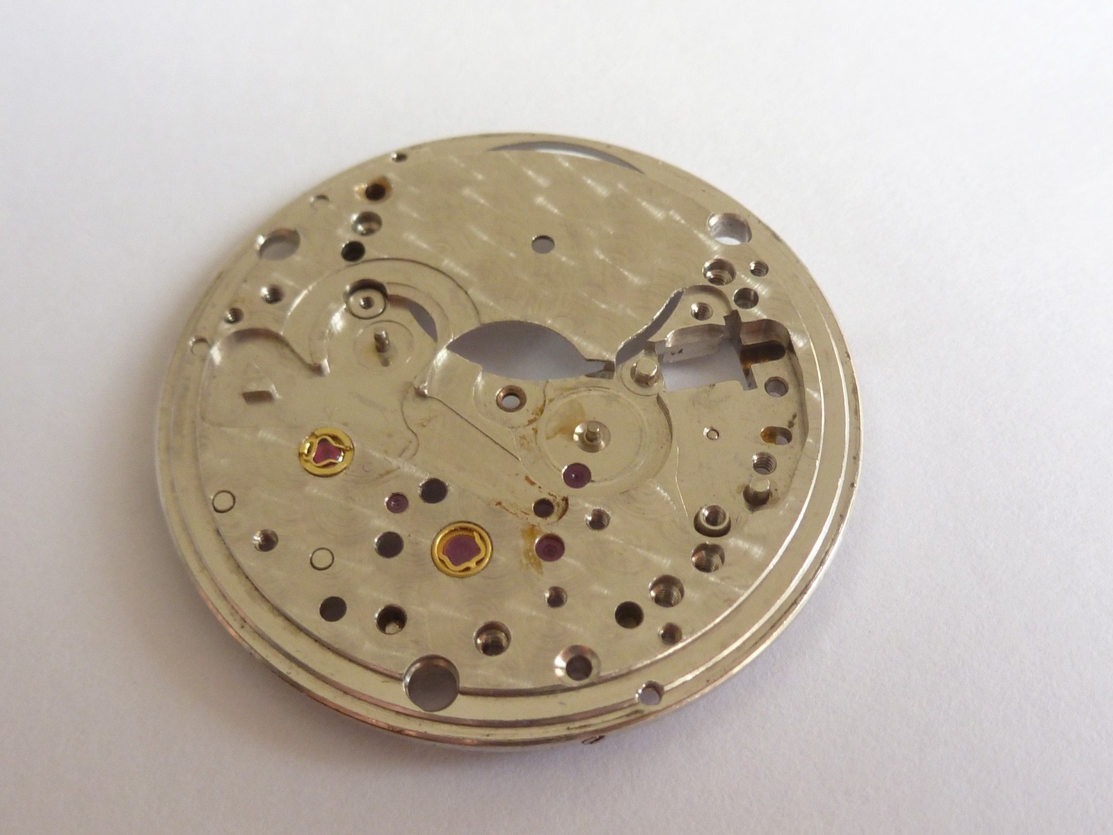 100% Authentic ROLEX 1570 Main Plate with all jewels mint condition 1530