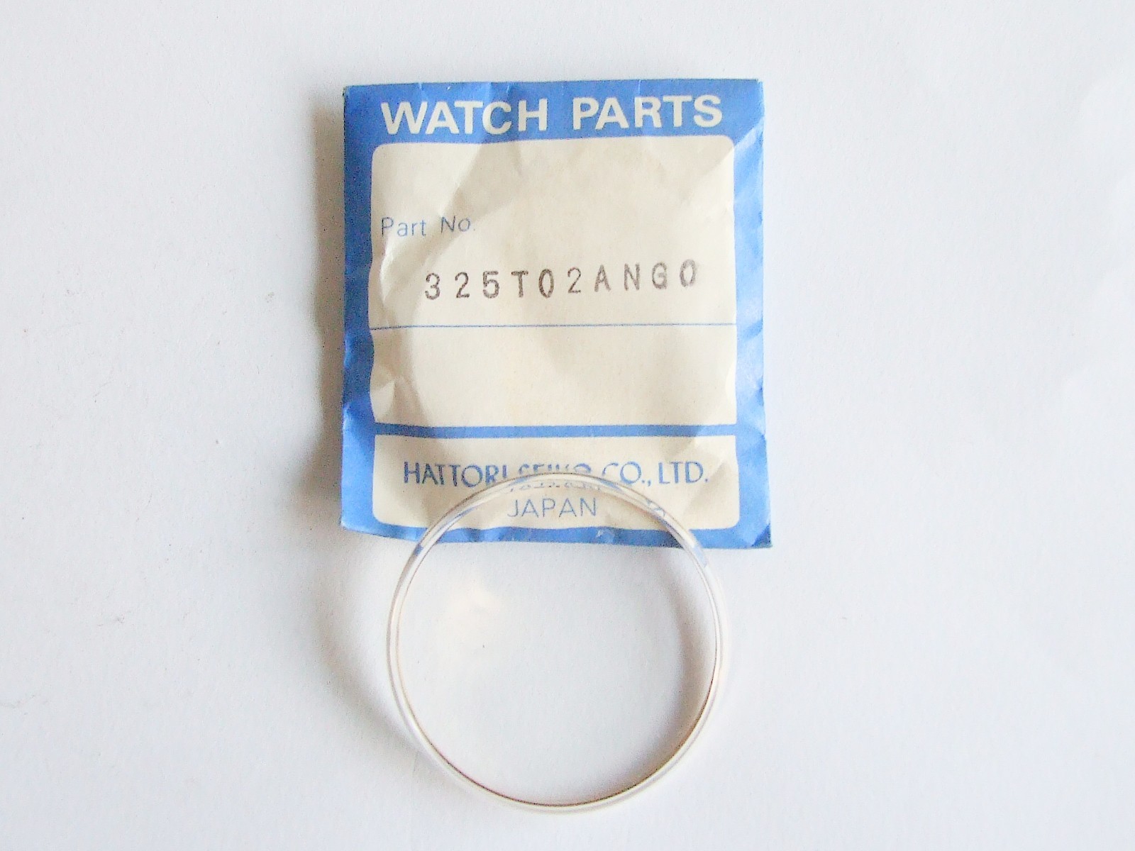 Original Seiko 325TO2ANGO watch crystal gold ring. New old stock