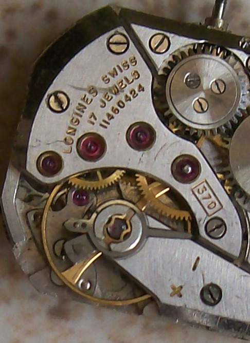 Vintage Longines Cal 370 wristwatch movement 23 mm. x 20 mm. aside