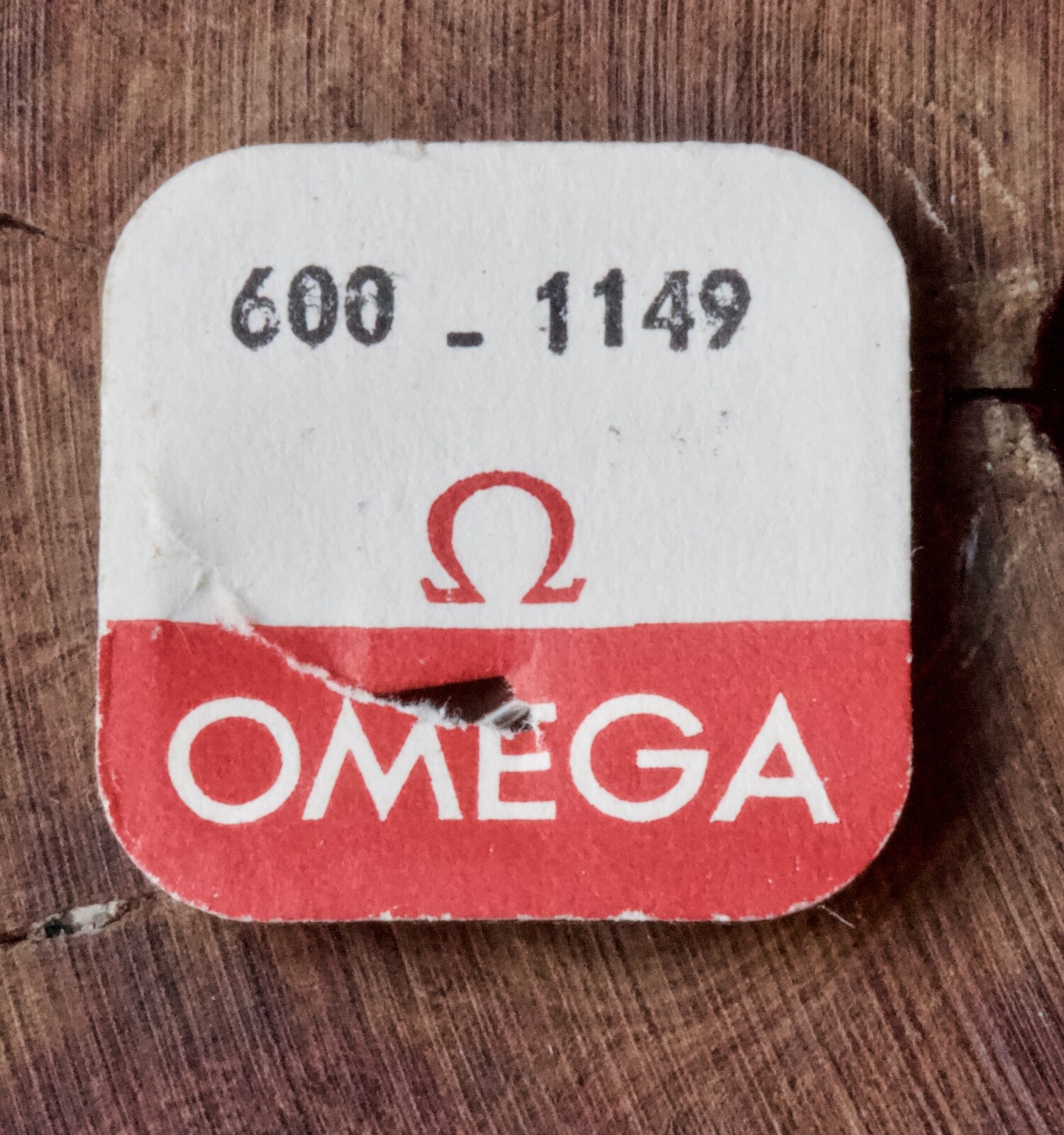NOS vintage Omega 600 caliber watch movement side of 2-pc winding stem male end