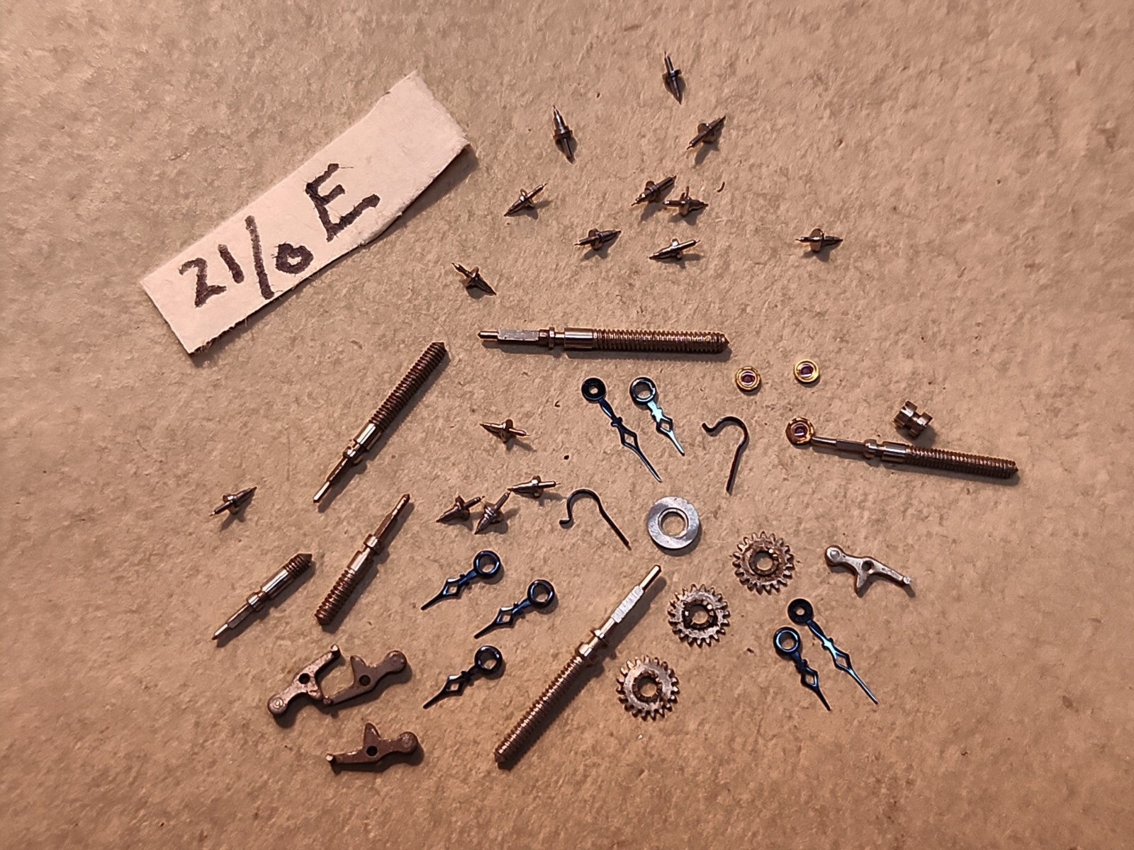 Lot Of NOS Elgin 21/0 Mixed Parts-Stems, Balance Staffs, Jewels, Hands, Etc