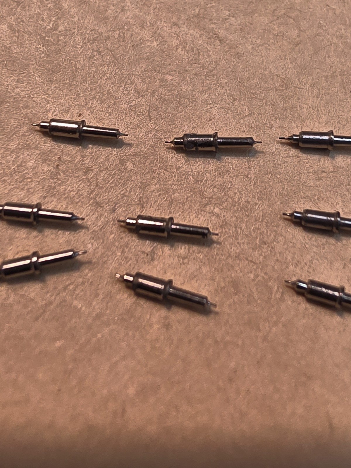 Lot Of 9 NOS Waltham 16s Model 99 Vanguard 4861 Tapered Hub Balance Staffs Parts