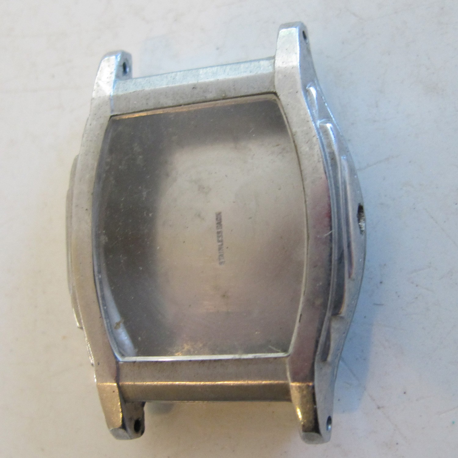 Unmarked WRISTWATCH CASE ONLY – BASE METAL- Barrel Shaped