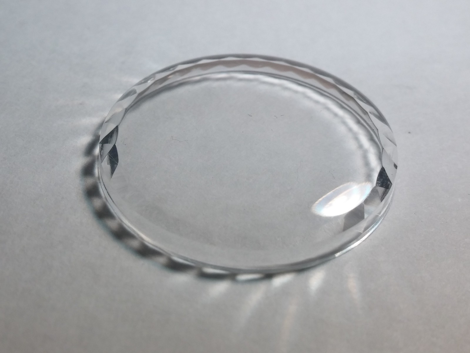 Unbranded crystal diamond round inside facet 27.4mm, 23 1/2, plastic