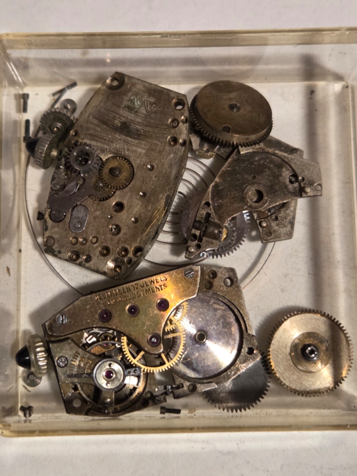 Two (2) A.Michel 640 movements. Partially disassembled, with parts.