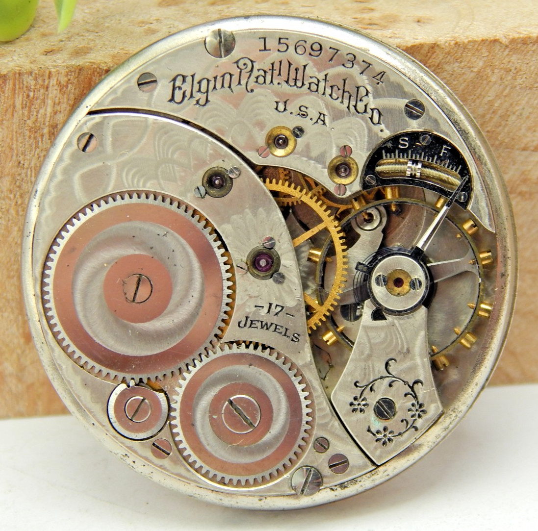 Antique 1911 Elgin 345 17 jewel 12s pocket watch movement with dial and hands