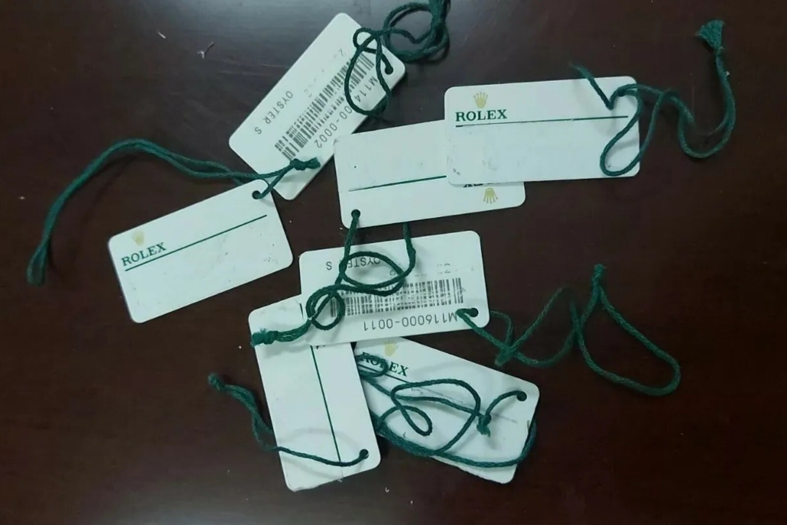 Genuine Rolex Warranty W& G Price label Hang Tags. Random Serial Numbers each