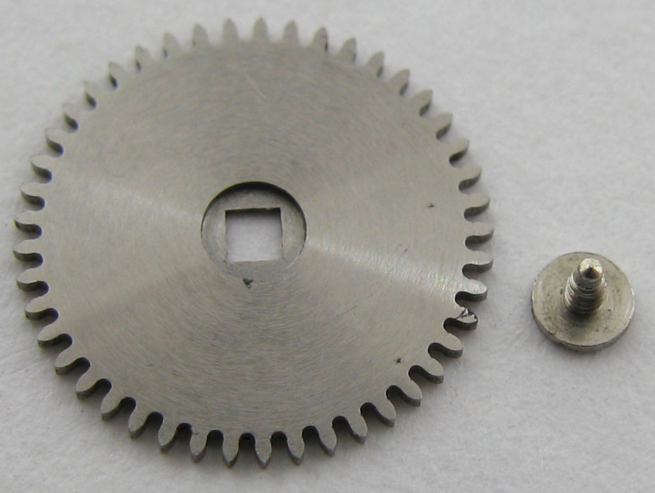 IWC c 89 Watch Part: ratchet wheel with its screw