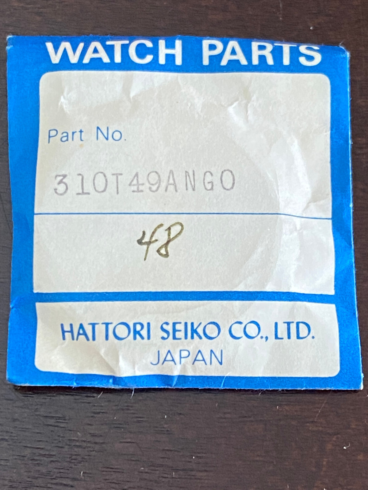 VINTAGE N.O.S. GENUINE SEIKO CRYSTAL , REF # 310T49ANG, ORIGINAL PACKAGE