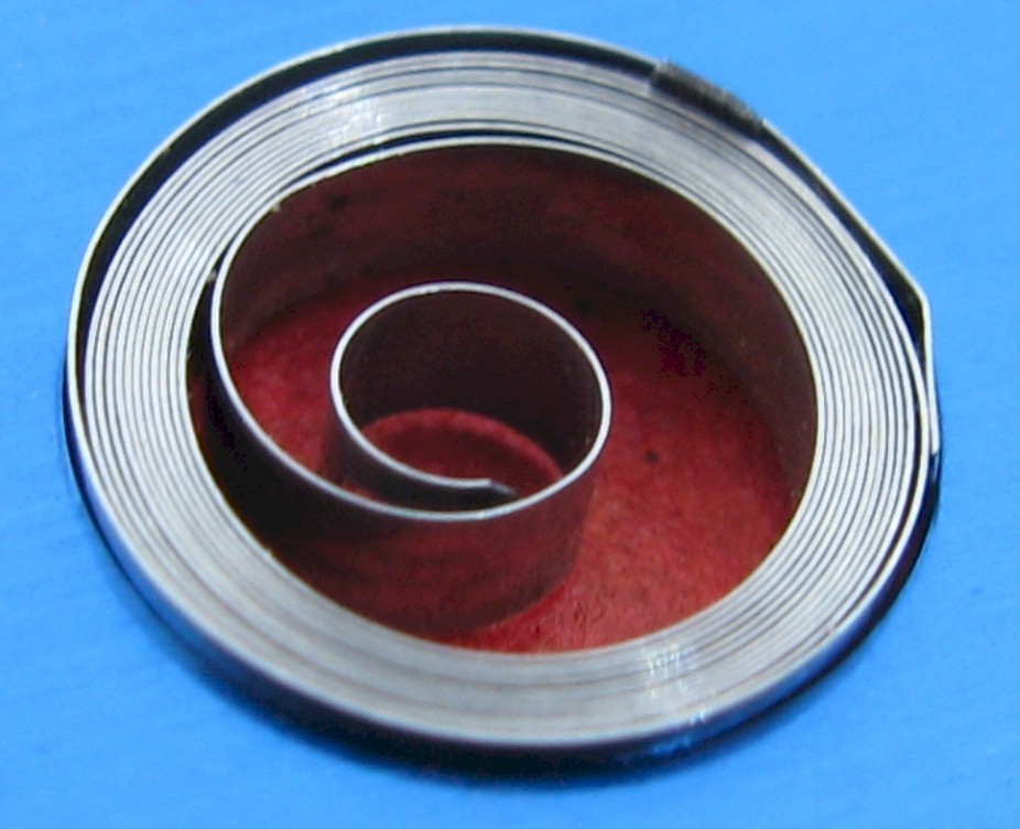 Elgin 21/0s watch part model 650 BA T end Mainspring white alloy