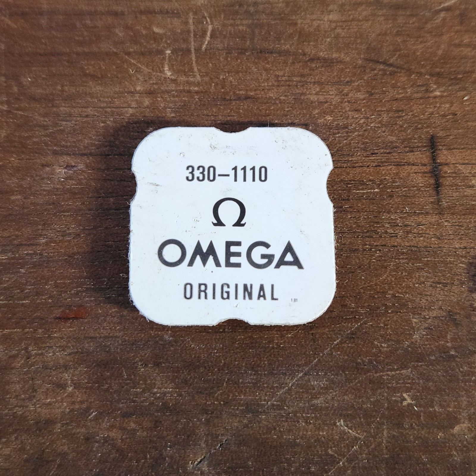 N.O.S. GENUINE OMEGA SETTING LEVER, PART# 330-1110, SEALED PACKAGE