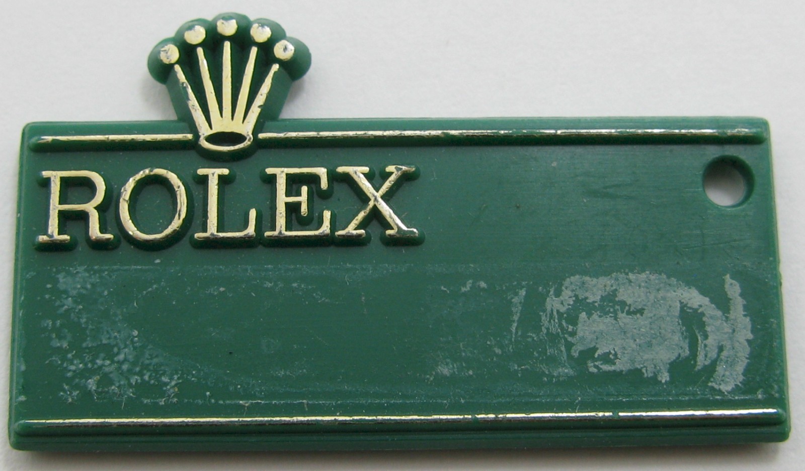 Rolex green watch tag raised crown … “DateJust etc. …”