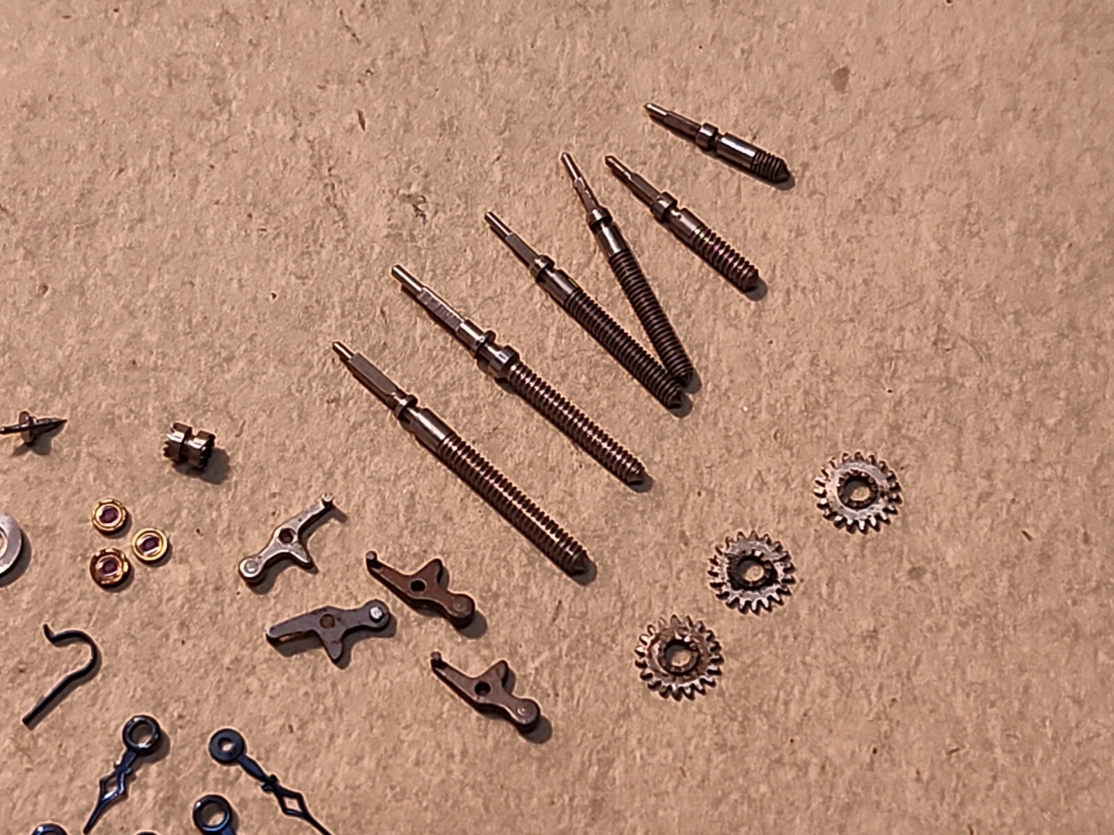Lot Of NOS Elgin 21/0 Mixed Parts-Stems, Balance Staffs, Jewels, Hands, Etc
