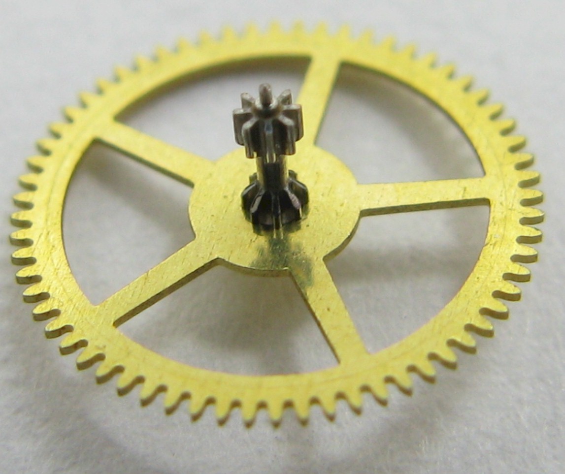 Seiko 6106 A 25 jewels watch part: intermediate wheel driving the second wheel