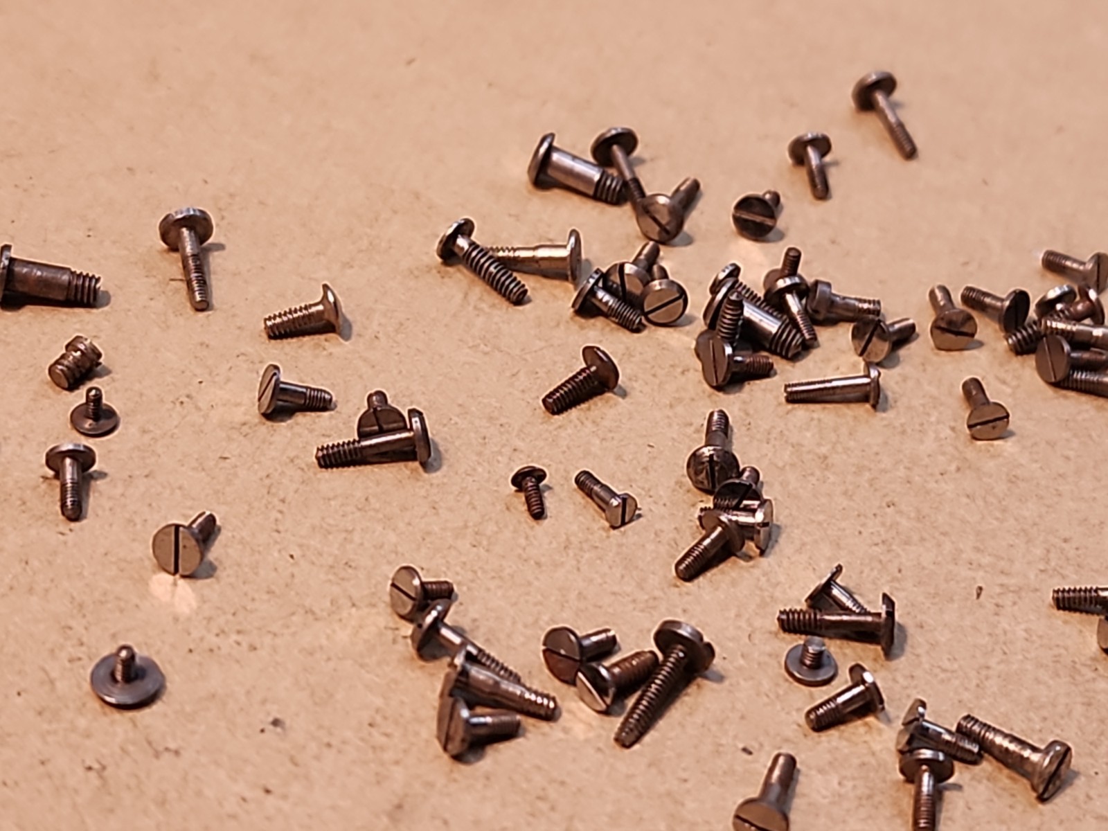 Lot Of 80 Mixed Pocket Watch/Wristwatch Case And Movement Screws Parts Spares