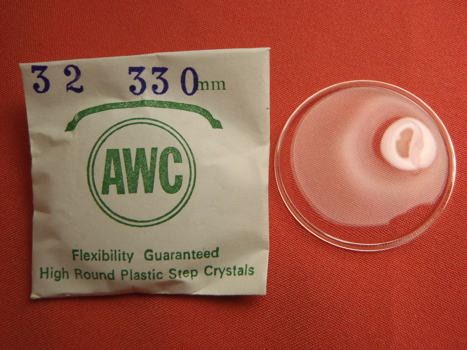 AWC HIGH ROUND PLASTIC WATCH STEP CRYSTAL 33.0 MM NOS