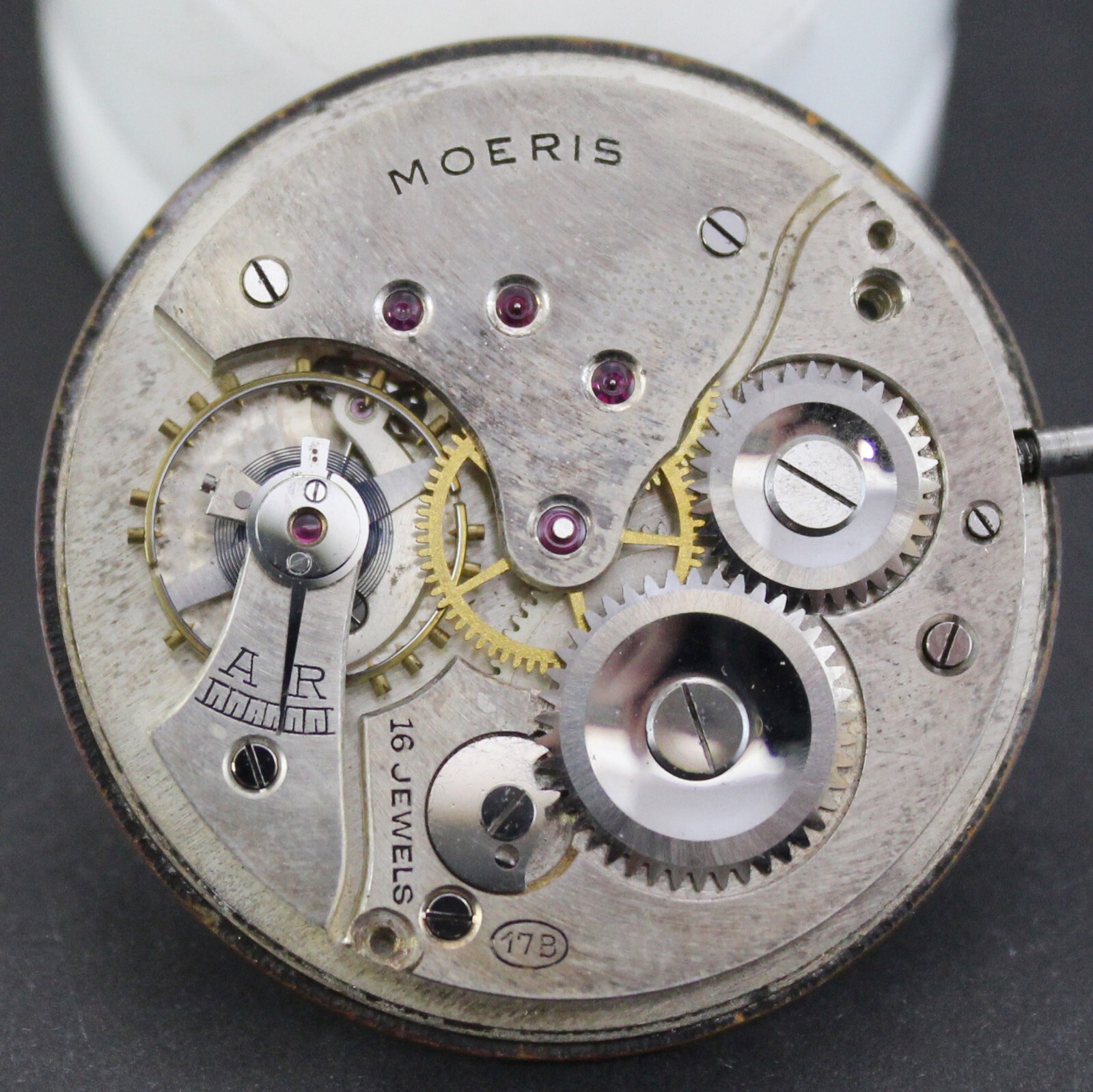 Antique Moeris manual Movement, dial, hands, winding stem & crown . Running!!