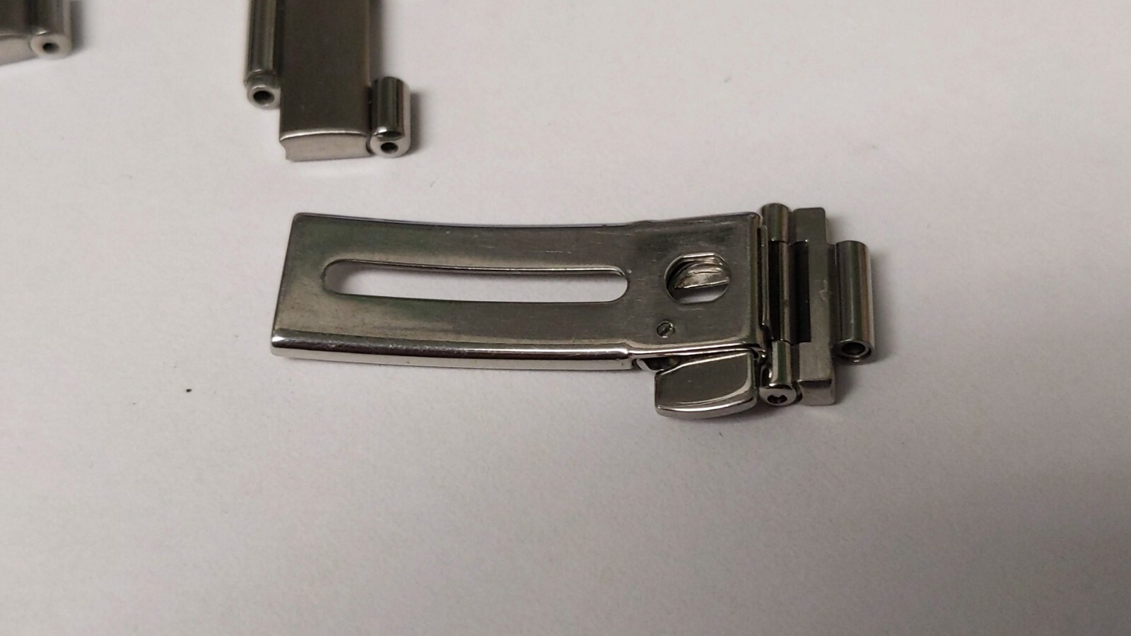 Omega LINKS S/S two pieces 18mm and one piece 12mm and clasp part. see photos. a