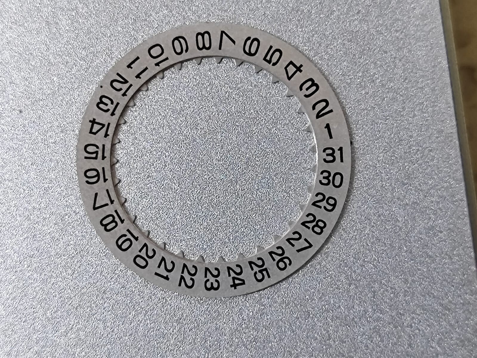 SEIKO Part 801 615 SEIKO GRAND 6146/6156 Date Disk Silver NOS