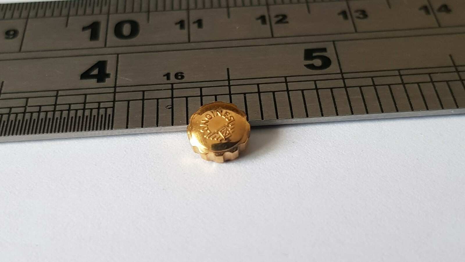 LONGINES YELLOW GOLD PLATED WATCH CROWN KEY (6.50mm x 3.10mm). (L-13)