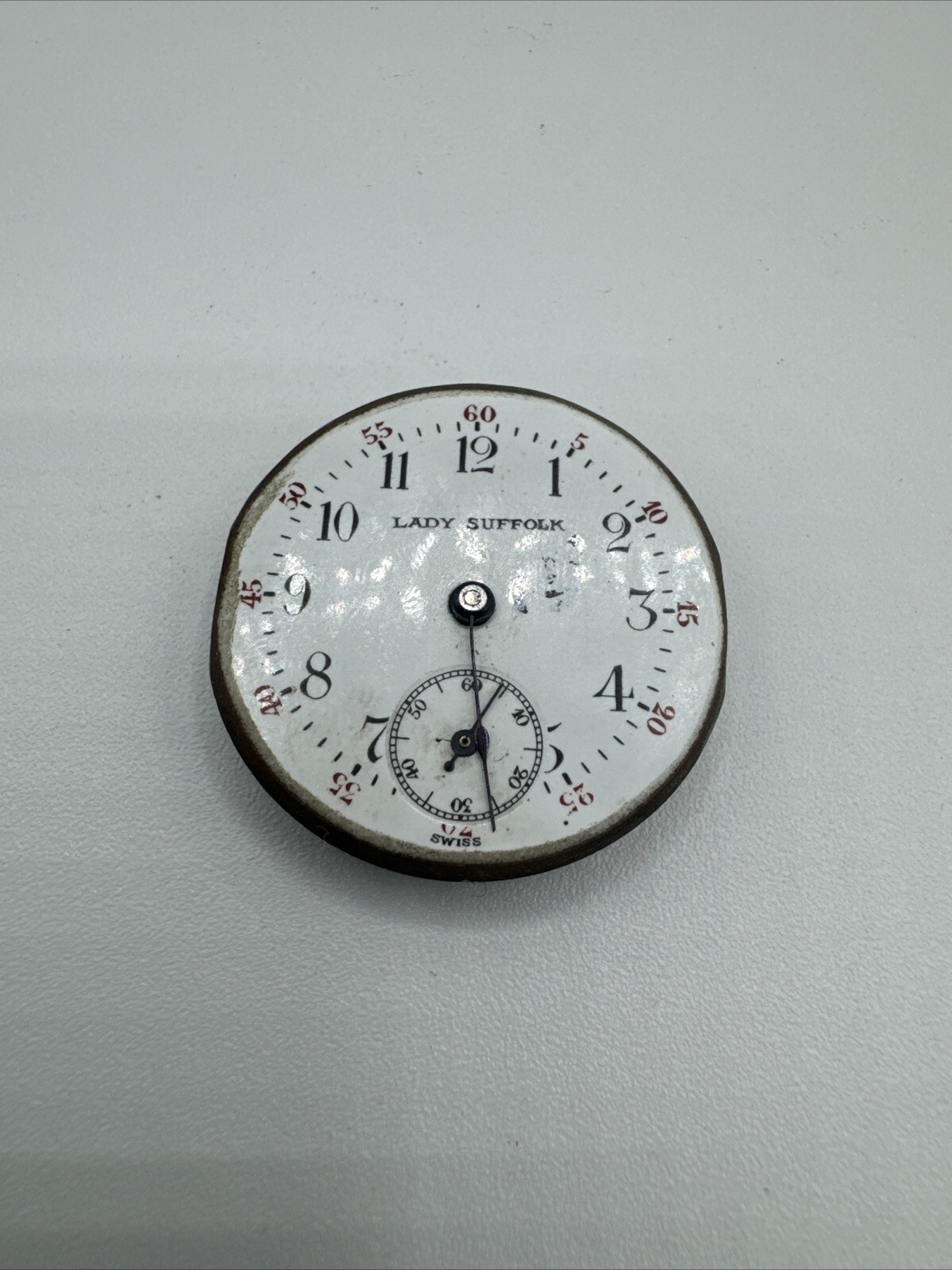 Antique Lady Suffolk Swiss Pocket Watch Movement. 28.9mm Porcelain Dial 7 jewels