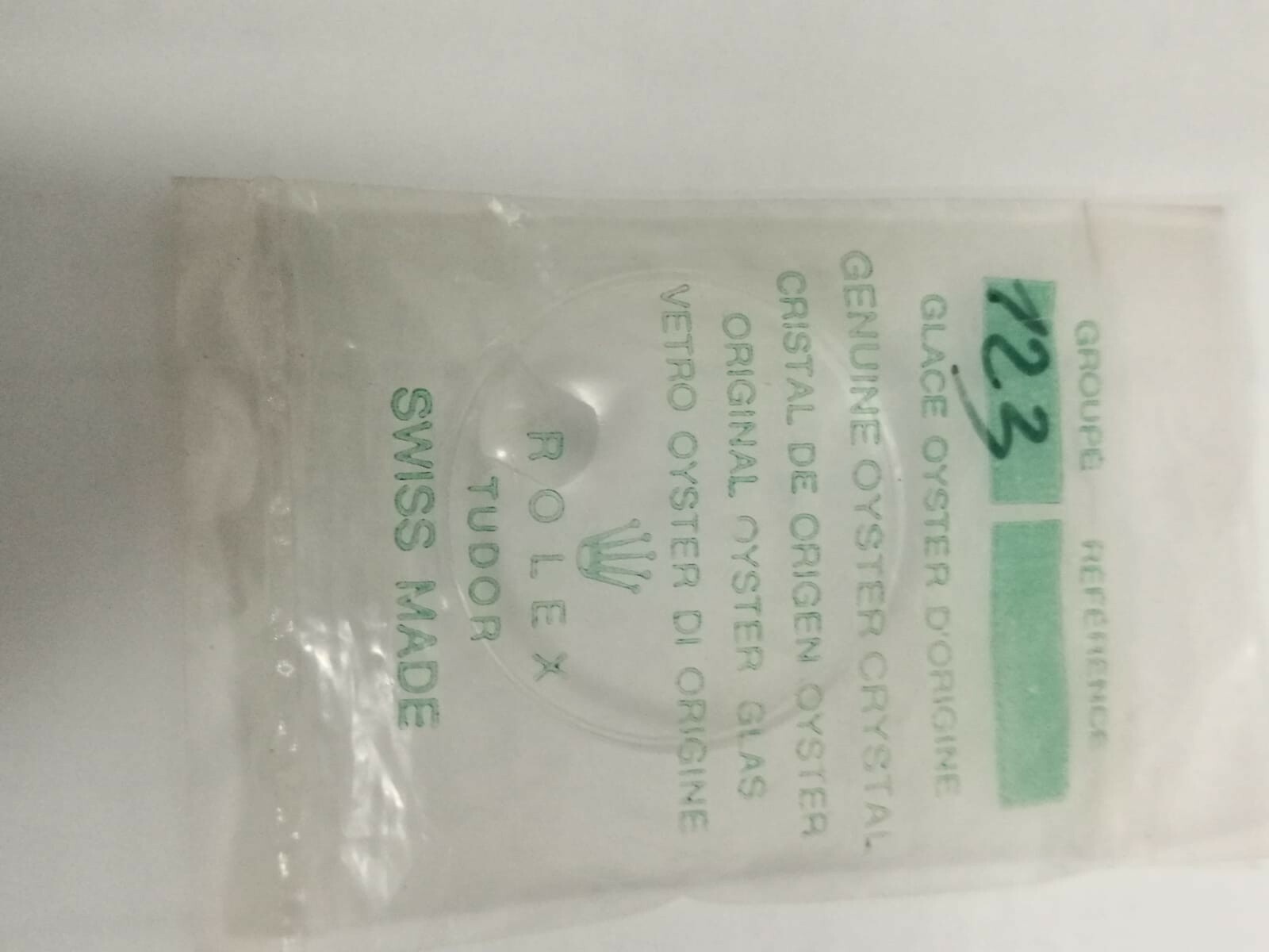 TUDOR ROLEX: VINTAGE PLASTIC GLASS.25/123