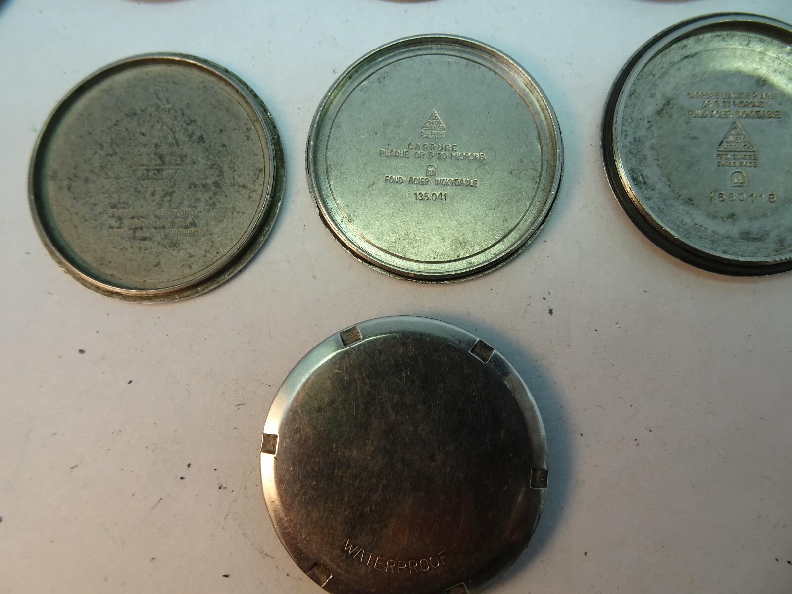 Omega vintage lot of stainless steel screwback watch covers for restorations