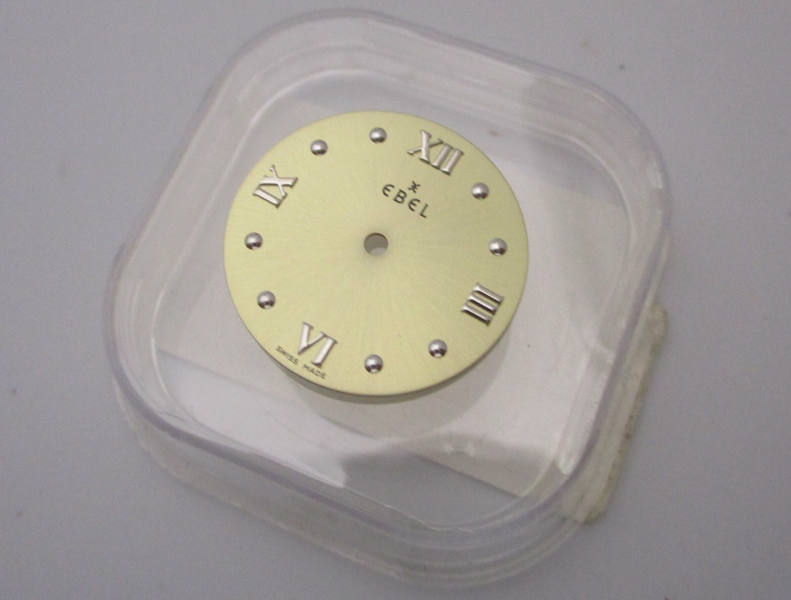 EBEL (Beluga?) Gold-Tone 20 mm Round Watch Dial w/feet approx. @ 28 & 50 minutes