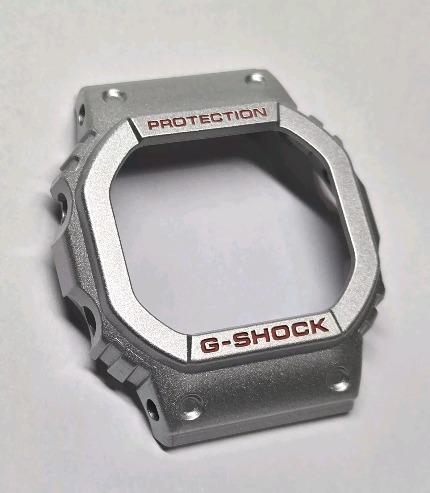 Genuine Casio part BEZEL for G SHOCK DW5600EU-8A3 METALLIC SILVER Tone **